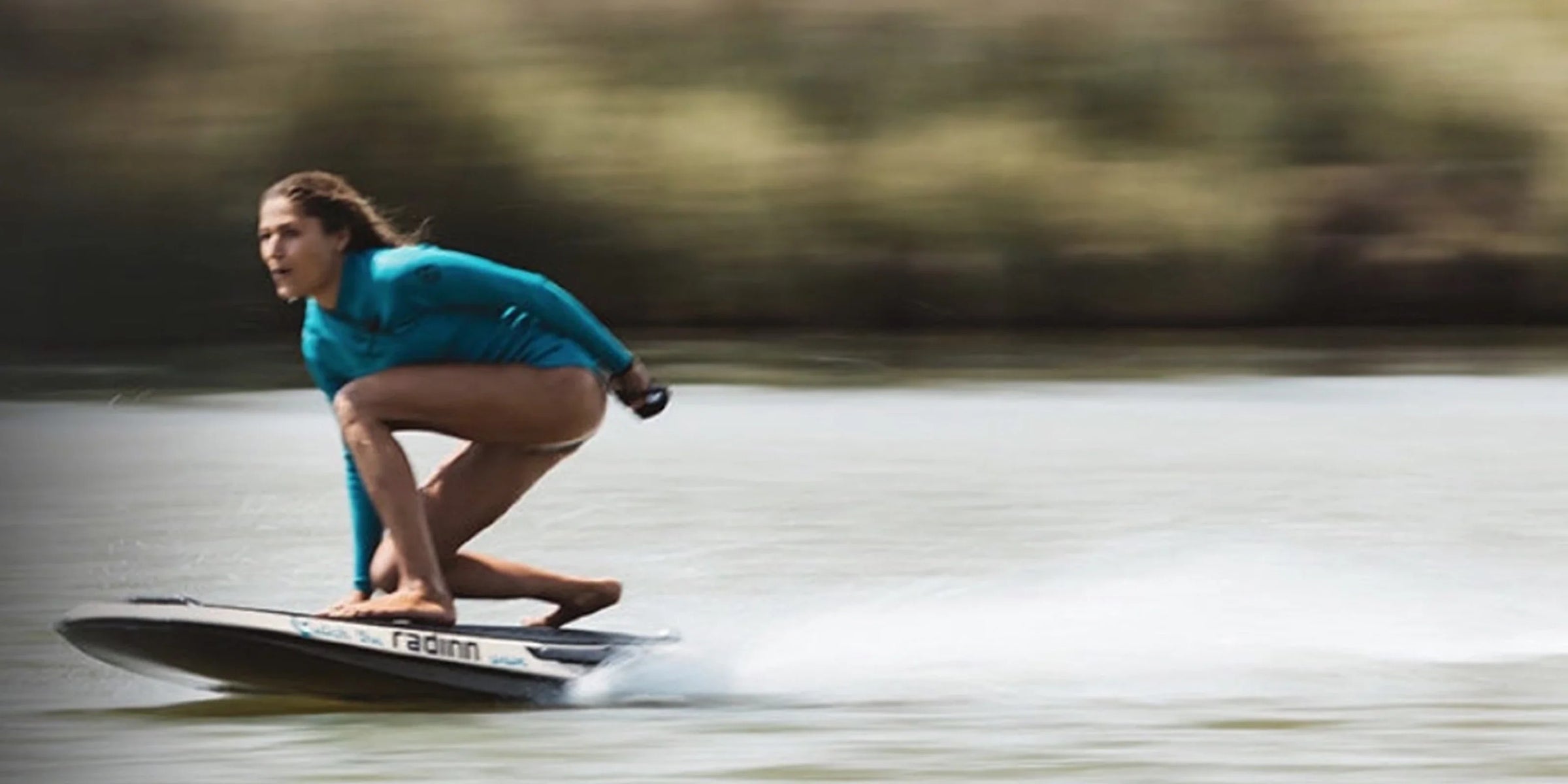 girl on a lake with jetboard